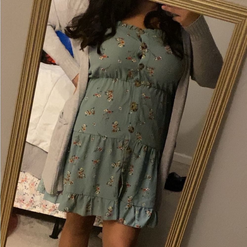Sage green dress, the dress is too short for my liking